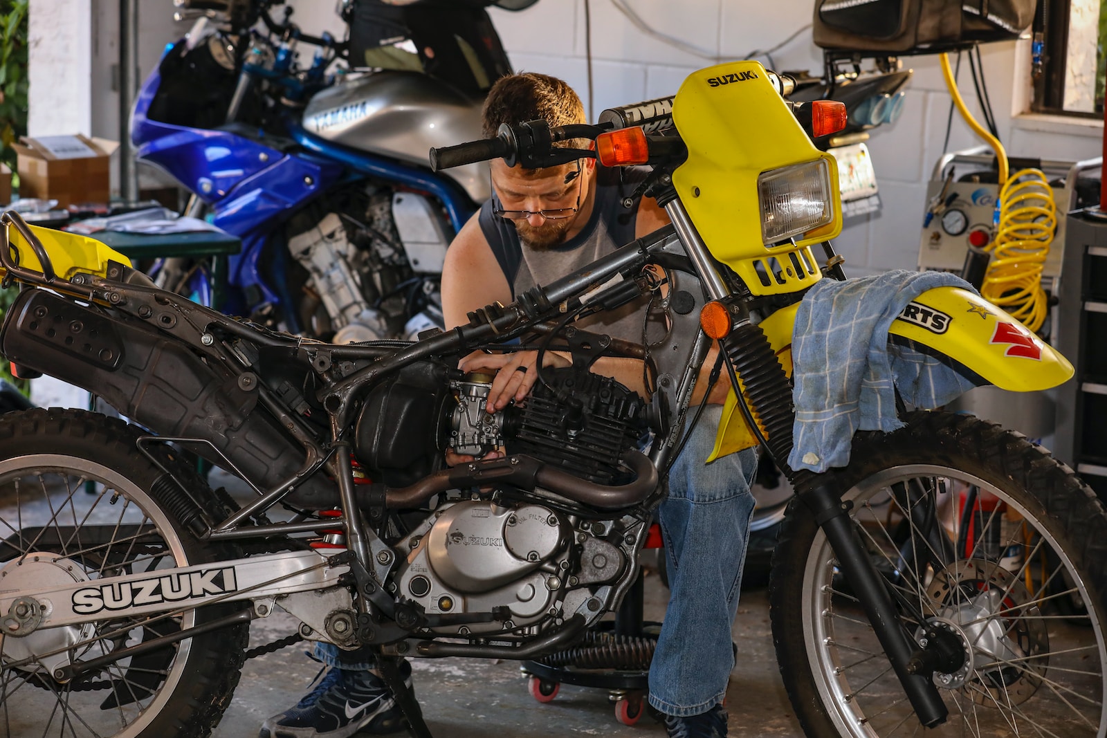 a person working on a motorcycle